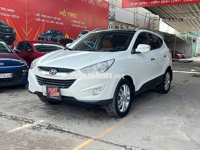 Hyundai Tucson 2011 2.0L xăng,màu trắng, nhập Hàn