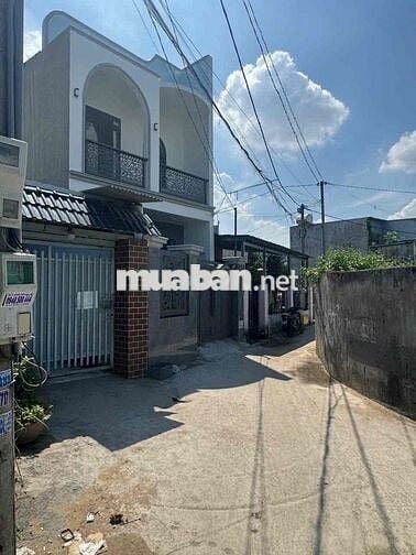 Bán nhà 1 trệt 1 lầu , sổ Hoàn Công DTSD 150m2 , ngay chợ Tân Vạn