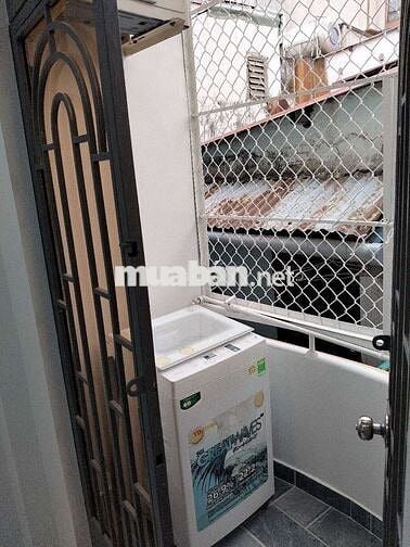 Nhà 2 lầu đúc hẻm nhỏ Lạc Long Quân TpHCM
