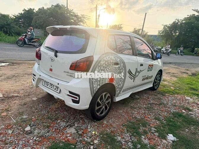 Toyota Wigo 2024 Trắng Tự động 5 chỗ