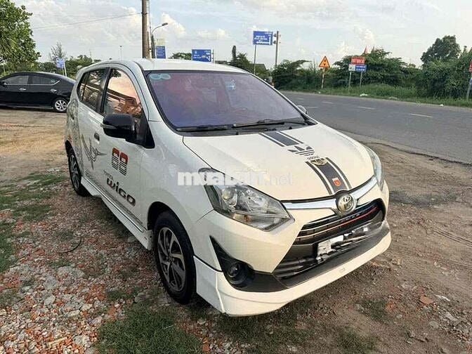 Toyota Wigo 2024 Trắng Tự động 5 chỗ