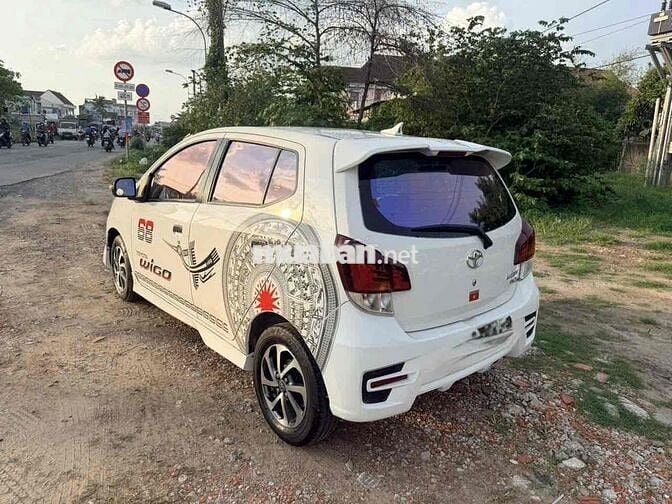 Toyota Wigo 2024 Trắng Tự động 5 chỗ