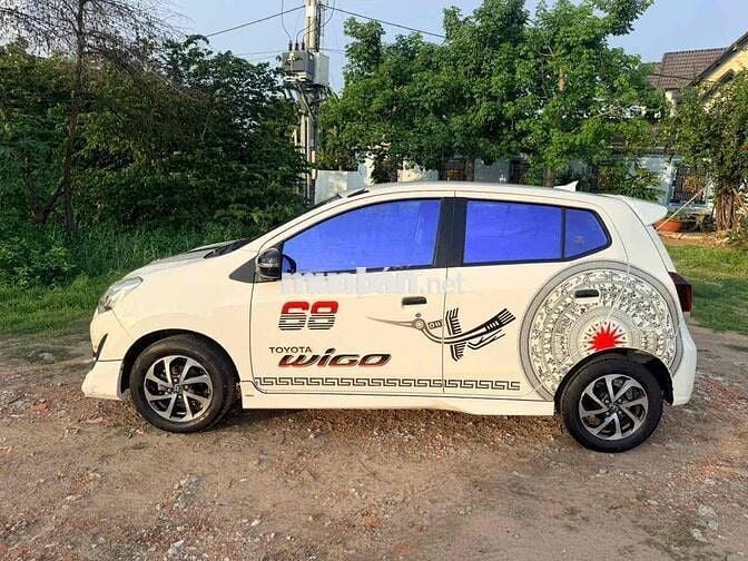 Toyota Wigo 2024 Trắng Tự động 5 chỗ