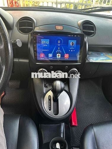 Mazda  2 2014 Trắng Tự động 134.000 km