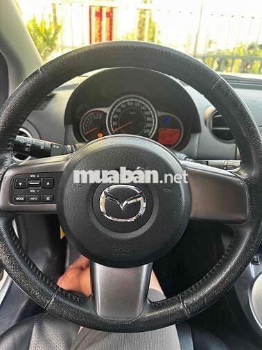 Mazda  2 2014 Trắng Tự động 134.000 km