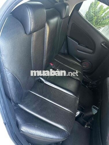 Mazda  2 2014 Trắng Tự động 134.000 km