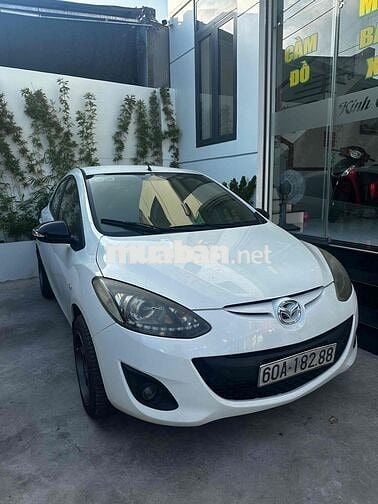 Mazda  2 2014 Trắng Tự động 134.000 km