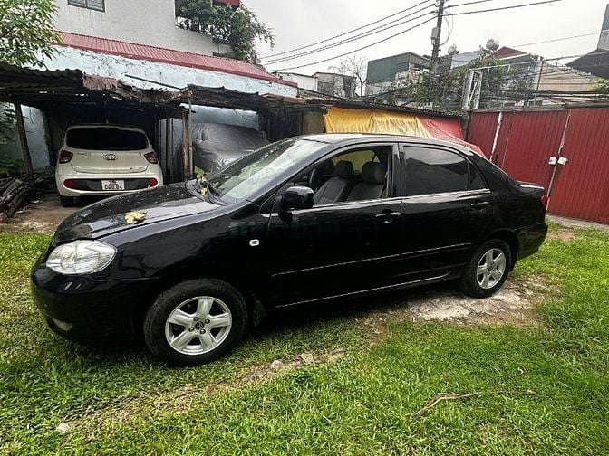 Cần bán Toyota Corolla Altis Đen 2003