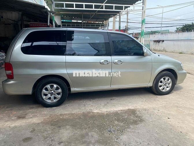 Kia Carnival 2009 Tự động Vàng cát