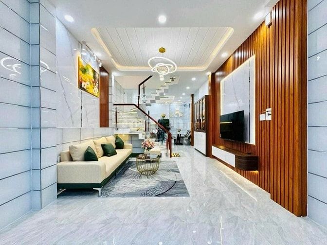 Căn 64.7m² Nơ Trang Long sổ sẵn. Xây 1 trệt 2 lầu, hẻm 4m. Gần chợ