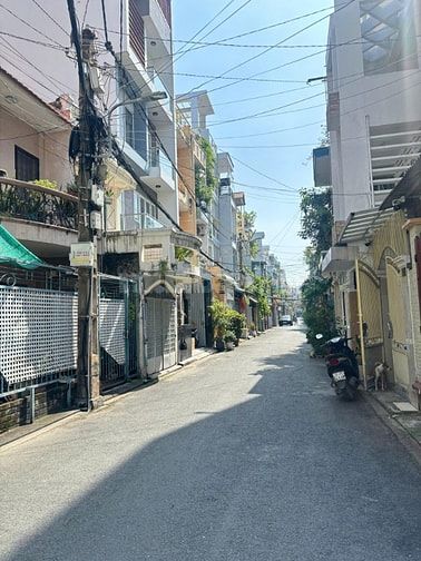 Góc 2MT hẻm xe hơi 305 Lê Văn Sỹ, DT 5x16m, 4 tầng. Giá 13.8 tỷ
