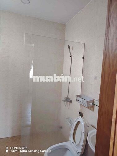 NHÀ SÂN XE HƠI 5x20 ĐƯỜNG TL15 GẦN NGÃ 4 GA