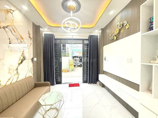 Cần bán nhà 1627/1a xe hơi trước nhà sổ chung với chủ nhà kế bên. 