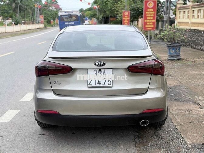 Kia K3 2015 Số sàn Vàng cát 5 chỗ