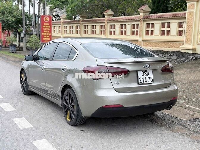 Kia K3 2015 Số sàn Vàng cát 5 chỗ