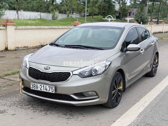 Kia K3 2015 Số sàn Vàng cát 5 chỗ