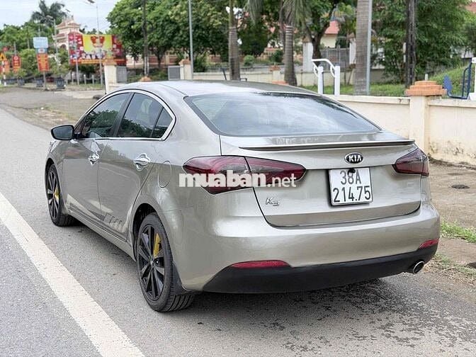 Kia K3 2015 Số sàn Vàng cát 5 chỗ