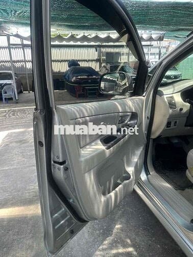 Toyota Innova G AT 2014 Tự động Bạc rin từ nắp cò