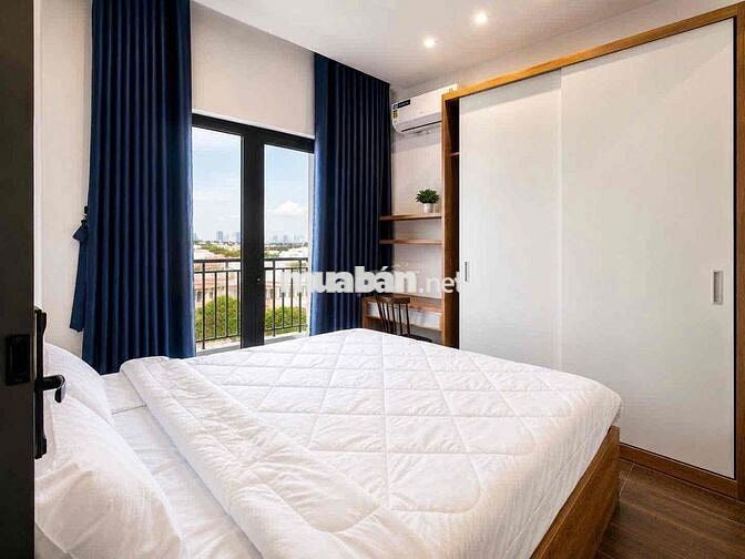 Luxury apartment with balcony overlooking fireworks.