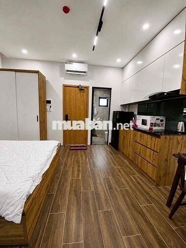 studio apartment has a balcony with a view of the fireworks