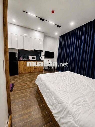 studio apartment has a balcony with a view of the fireworks