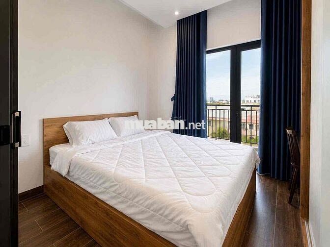 Luxury apartment with balcony overlooking fireworks.