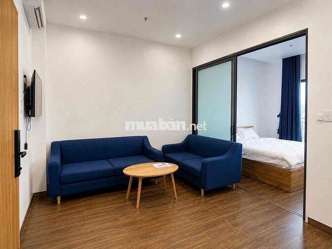 Luxury apartment with balcony overlooking fireworks.