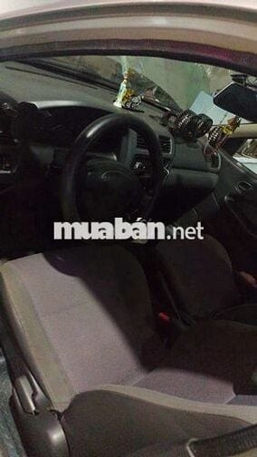 Mazda 323 1997 Bạc