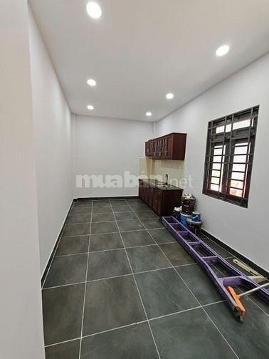 nhà mới xây 2 mặt tiền 107 Lý Chiêu Hoàng 4x28 5 tầng