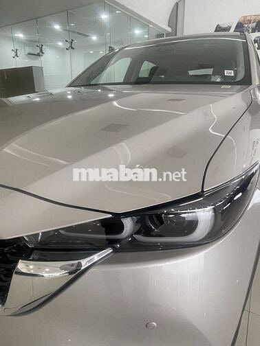 Mazda CX-5 Deluxe-E vàng ánh kim 5 chỗ