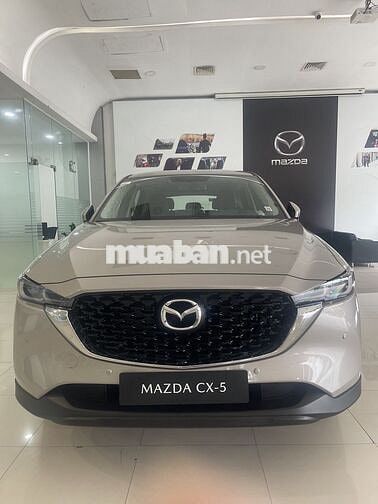Mazda CX-5 Deluxe-E vàng ánh kim 5 chỗ