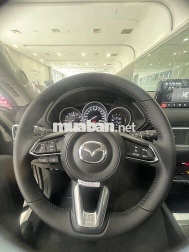 Mazda CX-5 Deluxe-E vàng ánh kim 5 chỗ