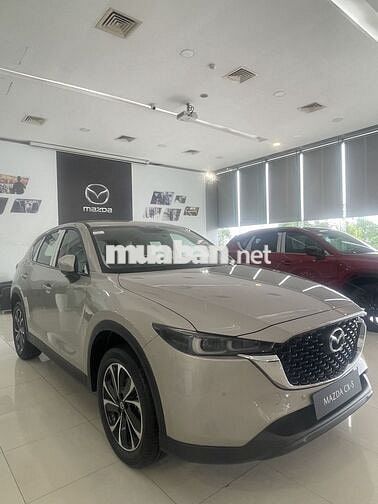 Mazda CX-5 Deluxe-E vàng ánh kim 5 chỗ