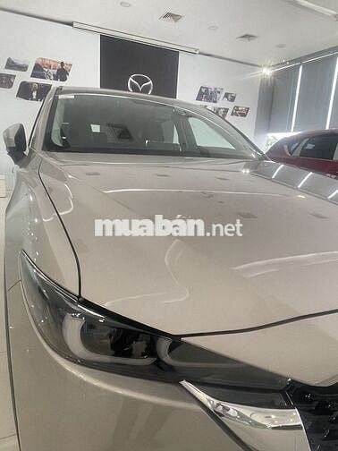 Mazda CX-5 Deluxe-E vàng ánh kim 5 chỗ