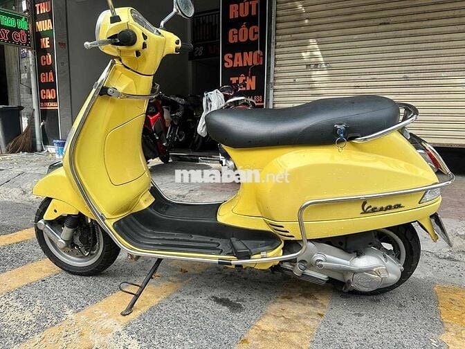 Piaggio Vespa LX 125 Vàng Bstp 9 chủ