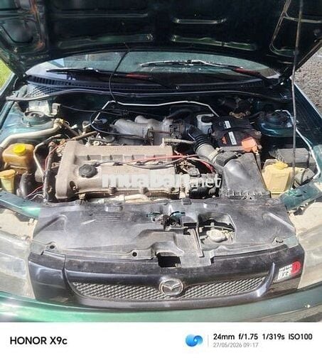 Mazda 323 GLXI 1997 Xanh Số sàn