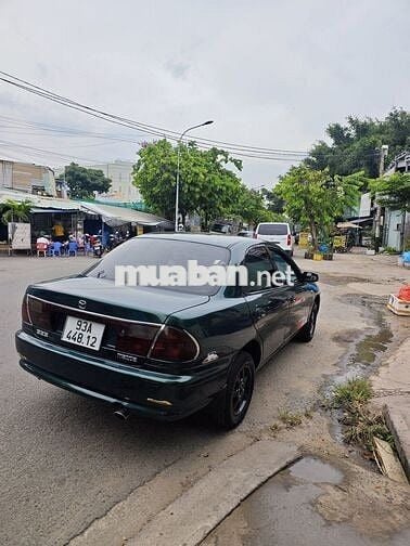 Mazda 323 GLXI 1997 Xanh Số sàn