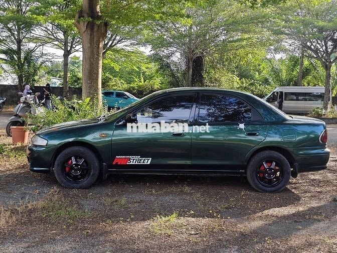 Mazda 323 GLXI 1997 Xanh Số sàn