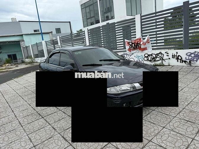 Mazda 323 2000 Số sàn Đen