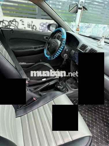 Mazda 323 2000 Số sàn Đen
