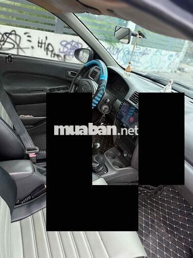 Mazda 323 2000 Số sàn Đen