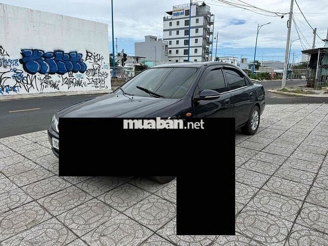 Mazda 323 2000 Số sàn Đen
