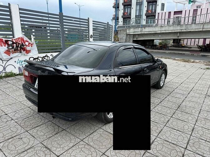 Mazda 323 2000 Số sàn Đen