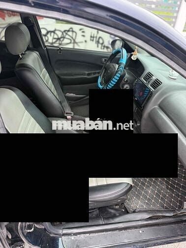 Mazda 323 2000 Số sàn Đen