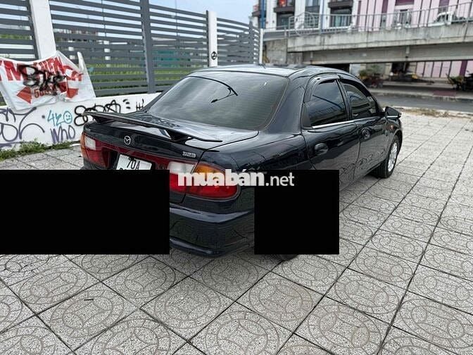 Mazda 323 2000 Số sàn Đen