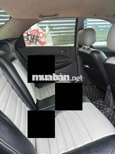 Mazda 323 2000 Số sàn Đen