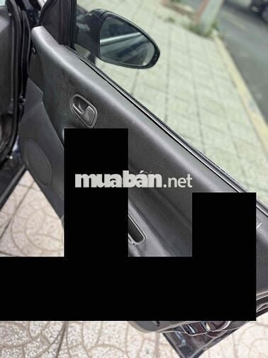 Mazda 323 2000 Số sàn Đen