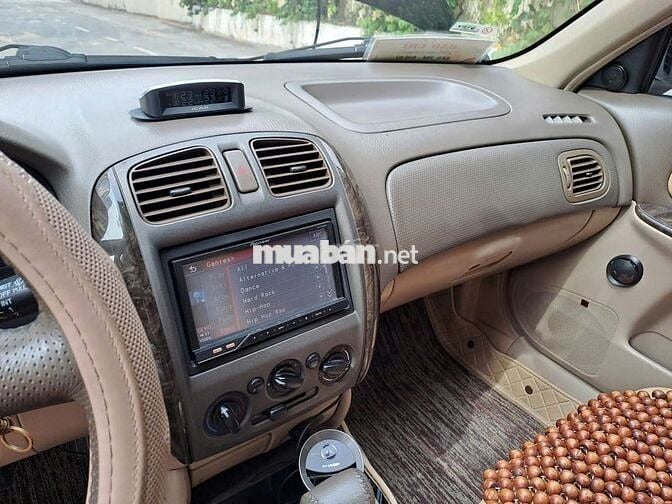 Ford Laser Ghia 1.8 Tự động 2004 Đen