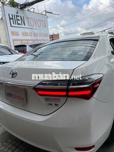 Toyota Corolla Altis 1.8E Trắng 51.000 km Số sàn