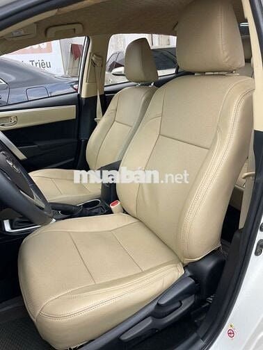 Toyota Corolla Altis 1.8E Trắng 51.000 km Số sàn
